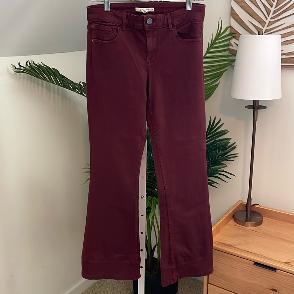 Alice + Olivia Stacey bell bottoms in garnet
